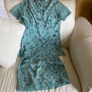 IN Wear two piece blouse and matching wrap around skirt